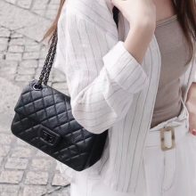 chanel-black-quilted-flap-bag-01